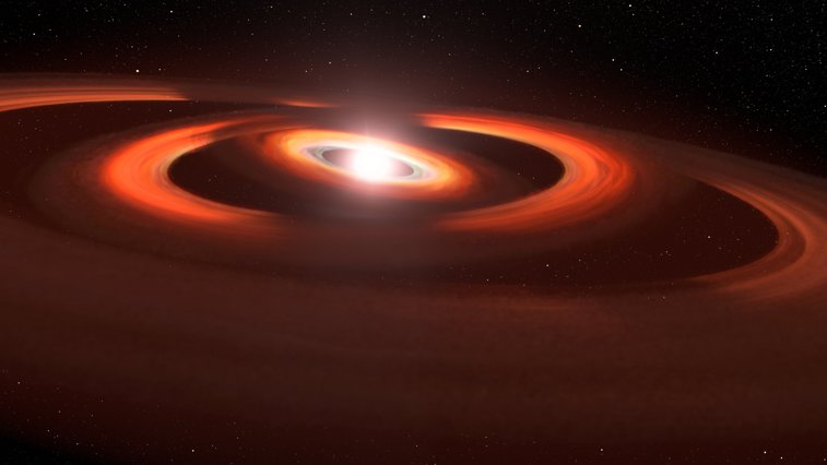 Imaginea articolului Astronomii au găsit dovezi ale existenţei a două planete în construcţie pe o stea îndepărtată