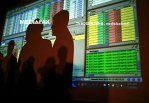 Raliu pe bursele de acţiuni după ce Fed a majorat dobânda