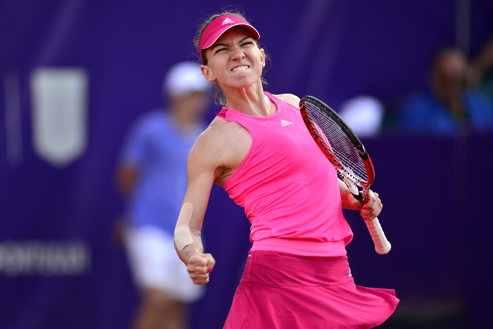Simona Halep reacţionează în finalul meciului cu Monica Niculescu, în cadrul turneului BRD Bucharest Open, sâmbătă, 12 iulie 2014.