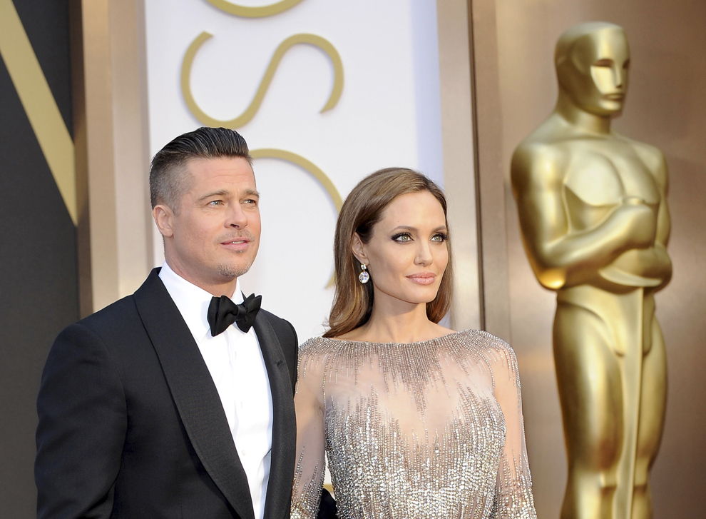 Brad Pitt şi Angelina Jolie sosesc la cea de-a  86-a ceremonie de decernare a Oscarurilor, în Hollywood, California.