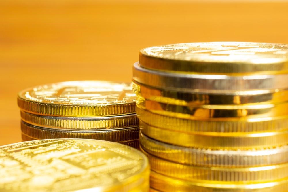 (P) 7 motive pentru a investi în monede de aur