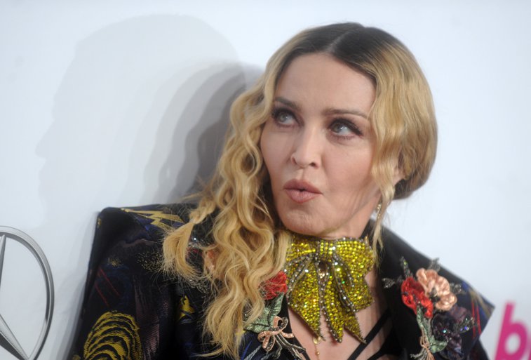 Imaginea articolului Gafă făcută de Madonna: a ţipat la un fan să se ridice, apoi a realizat că era în scaun cu rotile