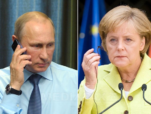 Imaginea articolului Vladimir Putin a avut 35 de discuţii telefonice cu Angela Merkel de la începutul anului