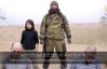 Imaginea articolului Stat Islamic prezintă executarea a doi agenţi ai serviciilor secrete ruse. Călăul, un copil de zece ani - VIDEO