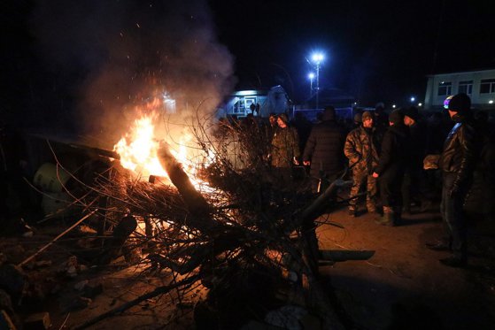 Imaginea articolului Teama de COVID-19 distruge armonia între oameni. Protestatarii violenţi din Ucraina propun ca persoanele evacuate din China să fie duse la Cernobîl