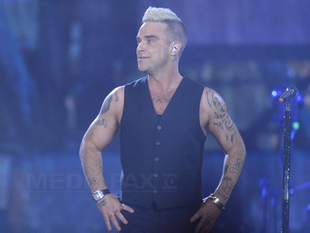 Imaginea articolului Robbie Williams se întoarce în studio alături de Take That, trupa care l-a făcut celebru