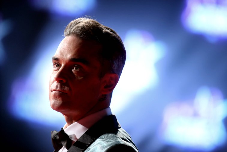 Imaginea articolului Robbie Williams l-a provocat pe cântăreţul Liam Gallagher la un meci de box „profesionist”: Evident, aş câştiga