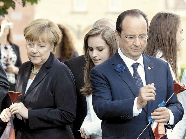 Hollande şi Merkel îi cer lui Vladimir Putin să-i aducă pe separatiştii din Ucraina la negocieri