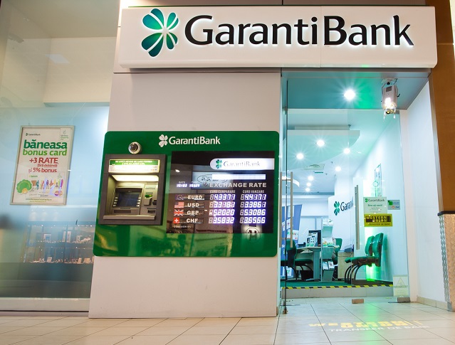 Garanti Bank România, scoasă la vânzare: patru bănci şi un fond de investiţii şi-au exprimat interesul. Garanti Bank România a răspuns: „Politica Grupului este să nu comenteze asupra zvonurilor sau surselor din piaţă“