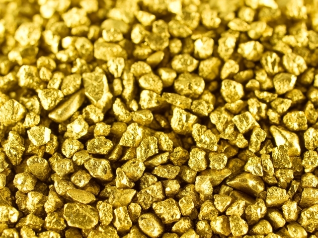 Lovite în plin de ieftinirea aurului, companiile miniere speră la o revenire modestă a metalului galben în 2014